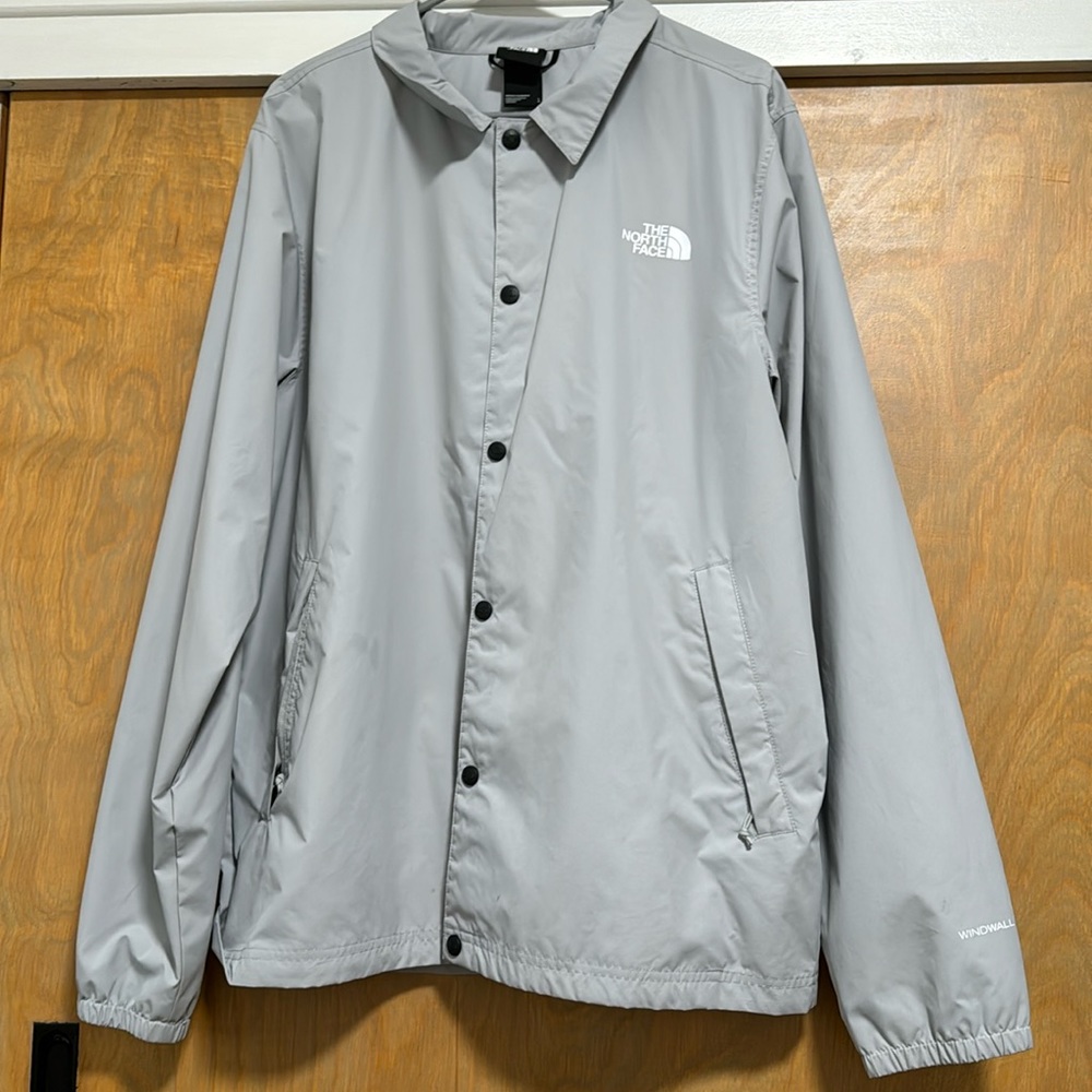 Grey north face coach jacket